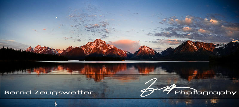Sunrise reflection of the Tetons and Mout Moran in Jackson Lake