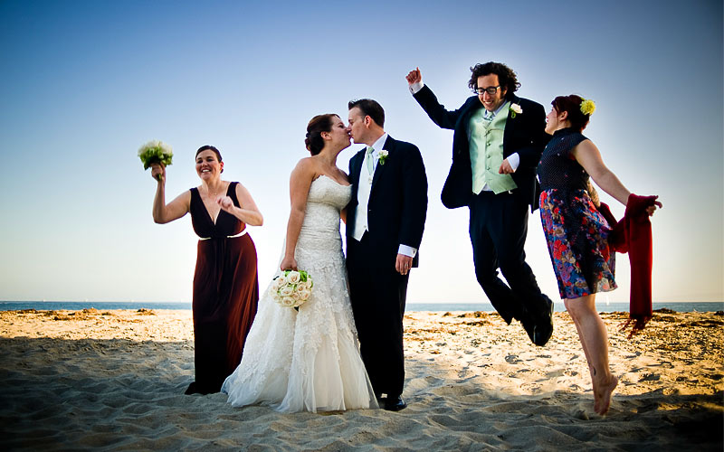 Bridal Party jumping in joy on the Beach