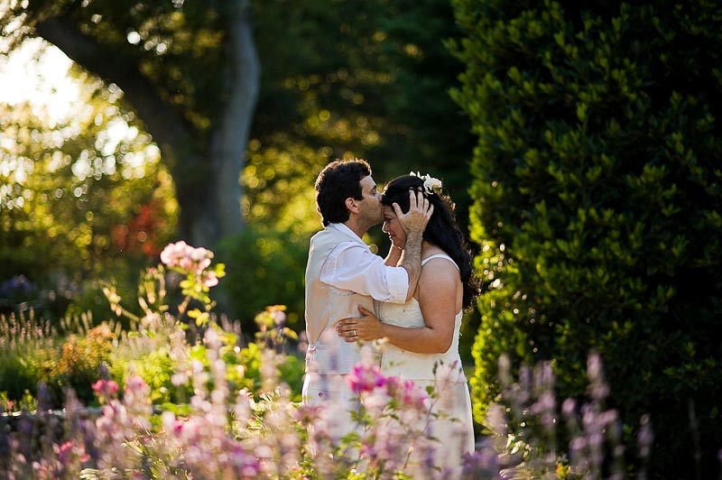 Backlit Photo of Groom kissing the Bride, near Avila Beach