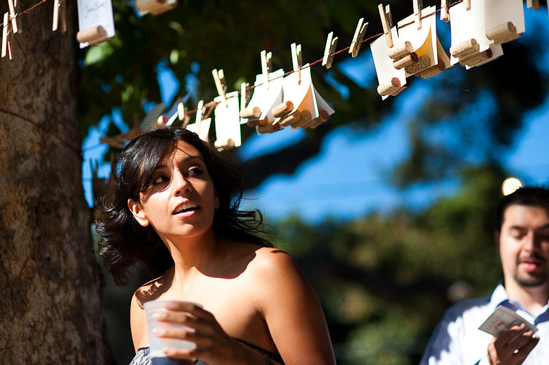 Beautiflu Woman Looking for her Placecard at Wedding Receiption