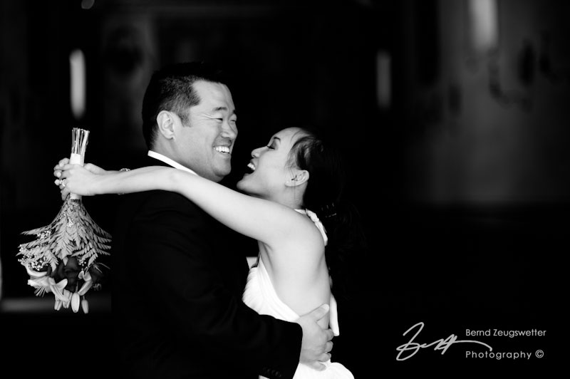 Bride and Groom huging at the Historic Santa Barbara Presidio.