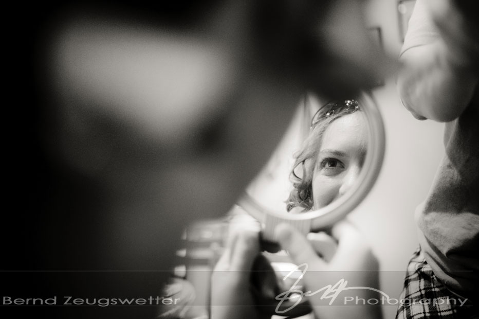Brides reflection in hand held mirror, Mammoth Lakes.