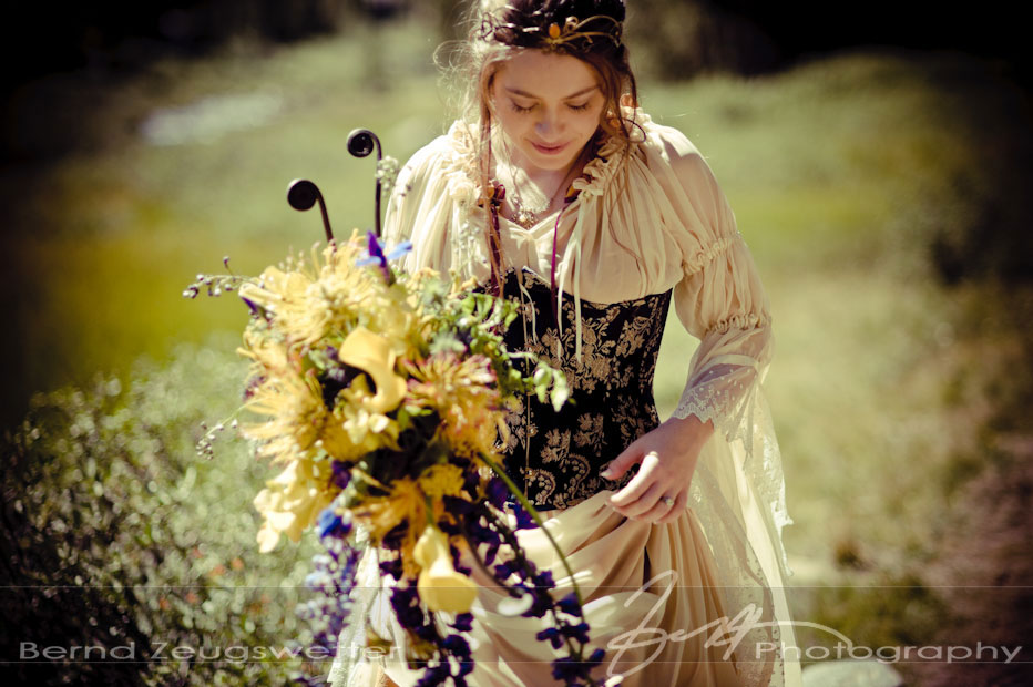 Portrait of bride in renaissance wedding gown.