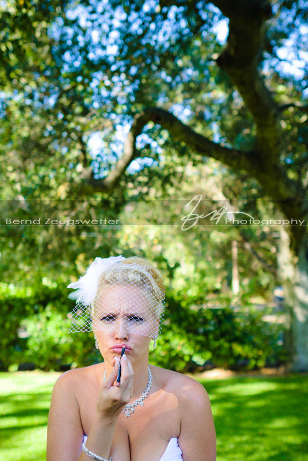 03 Sycamore Springs Resort Wedding Photography Photo of bride re-touching her lipstick, Sycamore Springs Resort and Spa