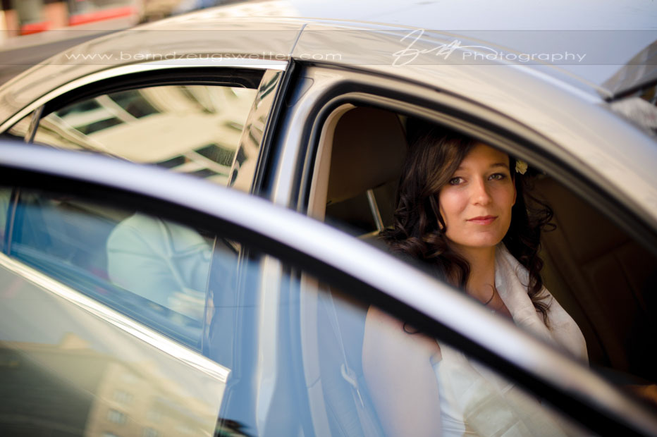 Bride in car on the way to ceremony, Vienna, Austria.
