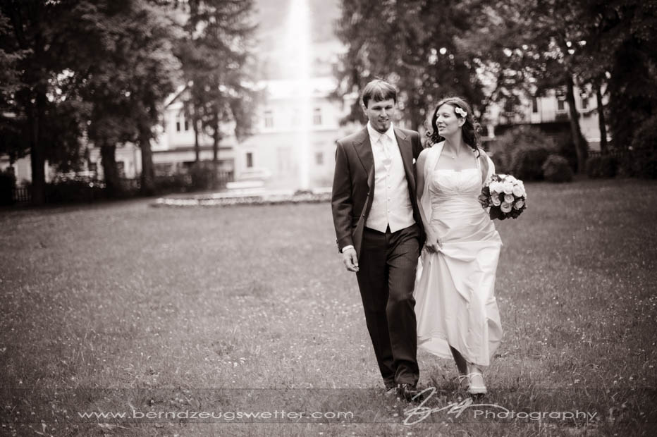 Portrait of wedding couple in city park, Reichenau an der Rax, Austria.