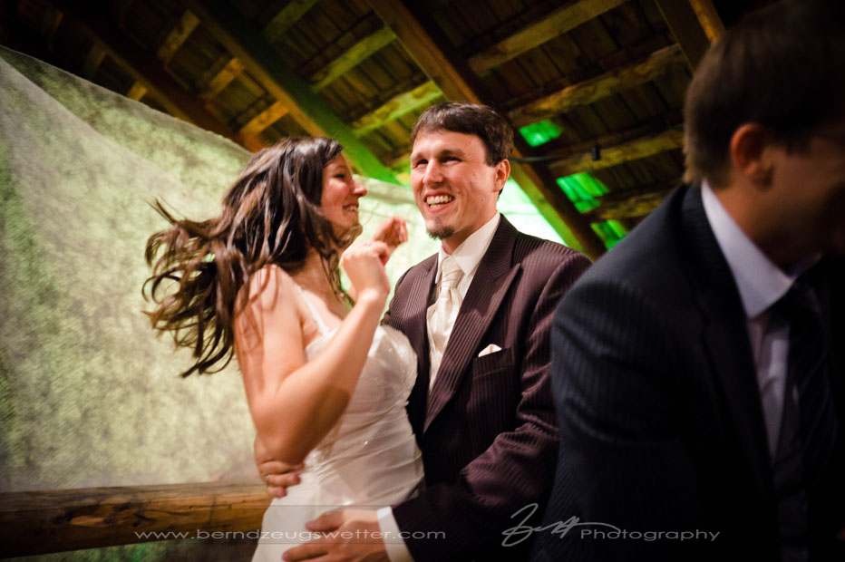 Bride and groom dancing at wedding, Nasswald, Austria.