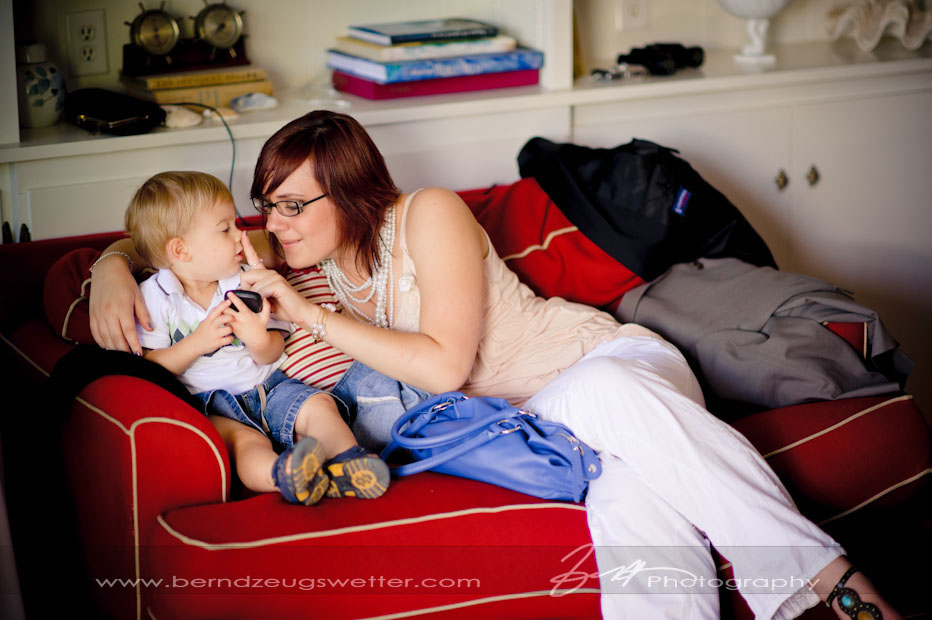 Young woman and baby at wedding reception, Rincon Beach, Carpinteria.