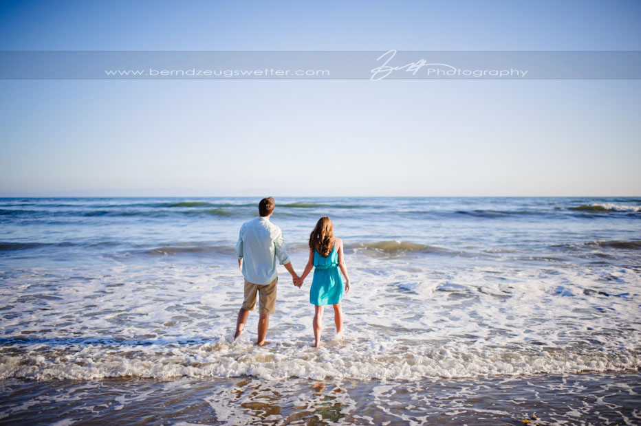 Engaged couple holding hands, Arroyo Burro, Santa Barbara.