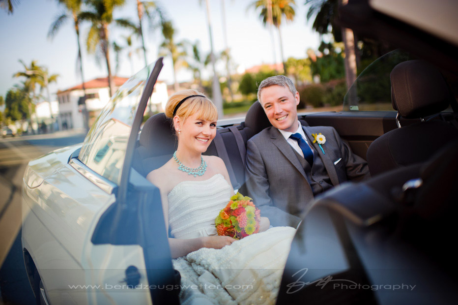 Portrait of bride and groom in convertible, Santa Barbara wedding photography.