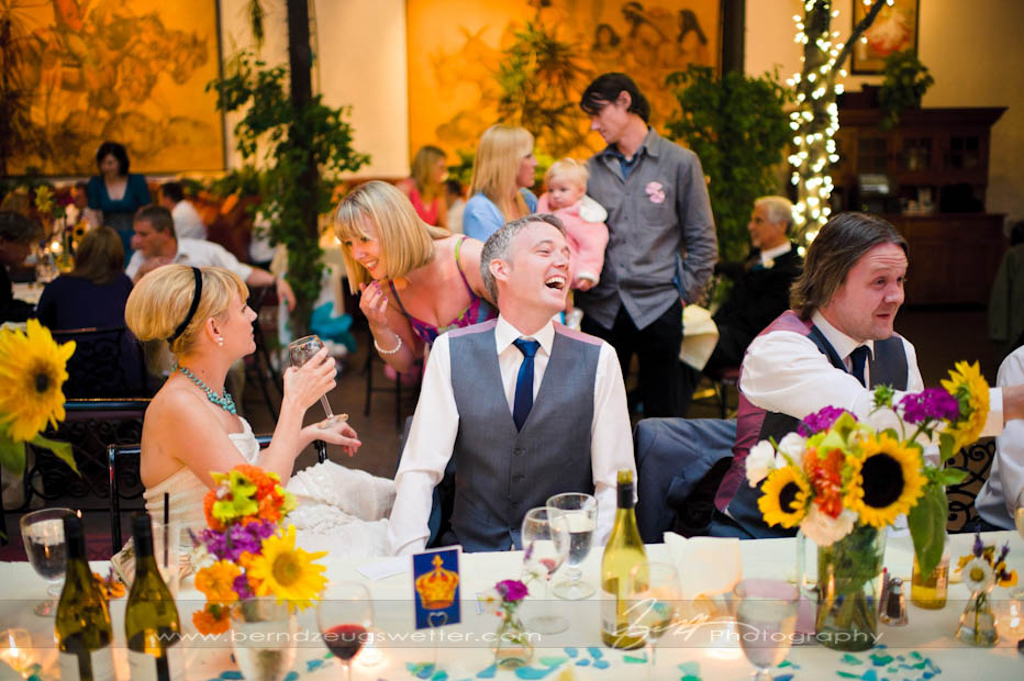 Bride and groom with guests at wedding reception, El Paseo Restaurant, Santa Barbara.