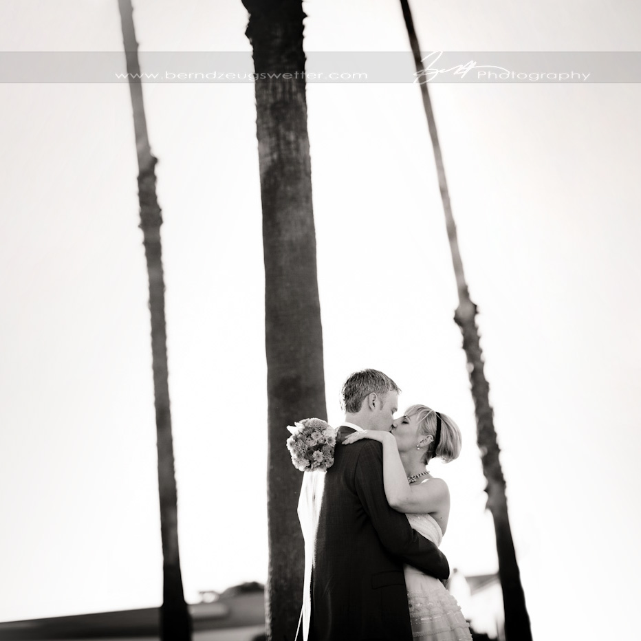 Portrait of bride and groom at East Beach, Santa Barbara wedding photographer.