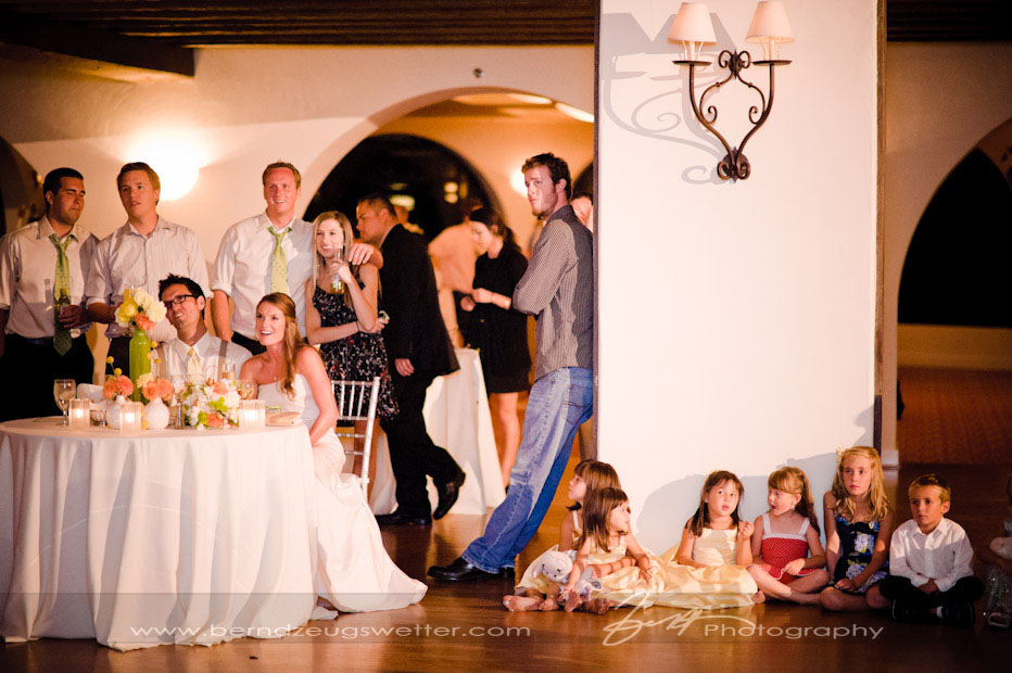 Bride and Groom and Wedding guests watching slide show at the Montecito Country Club.