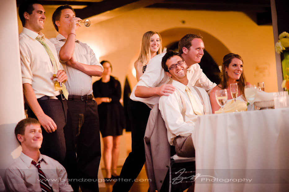 Happy interaction between groom and Wedding guests.
