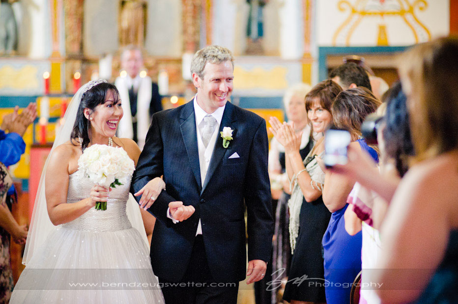 Bride and Groom in El Presidio Chapel, Santa Barbara wedding photographer.