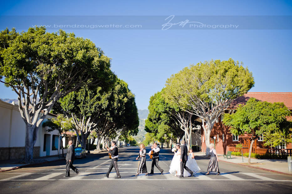 Walking to Granada Theater, Santa Barbara wedding photographer.
