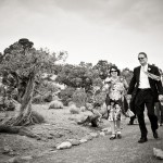 Wedding guests walking to the cliff-side ceremony.