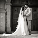 Bride and groom in front of the Old Mission's portal.