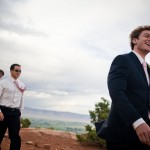 Groom and groomsmen walking to the site of the wedding ceremony.