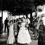 Bride and bridal party approaching church, Ventura