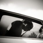 Bride stepping out of the car.