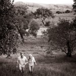 Couple walking on hill at Firestone Vineyard.