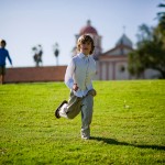 Child running at the Old Santa Barbara Mission grounds.
