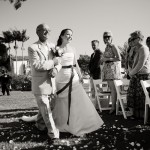 Father-of-the-bride walking bride down the isle in the Rose Garden.