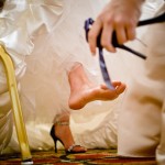 Detail of bride's feet and shoes.