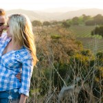 Portrait of couple overlooking Firestone Vineyard, Santa Ynez Valley.