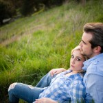 Couple's engagement portrait in evening light at Firestone Vineyard.