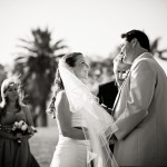Bride and groom getting hitched in the Rose Garden of the Mission.