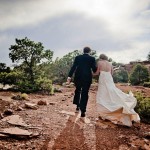 Bride and groom leaving the ceremony site, Colorado Plateau.