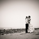 Portrait of bride and groom on beach at Rincon Point near Carpinteria