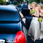 Bridesmaids getting into their limousine, Santa Barbara.