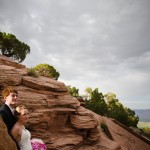 Bride and groom looking out over Wedding Canyon, Colorado National Monument.