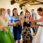 Bride goofing off with her friends at the reception, Santa Barbara.
