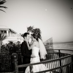 Bride and groom in embrace outside the Coral Casino, Santa Barbara Biltmore.