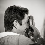 Wedding guest taking snap-shots at the reception, Santa Barbara.