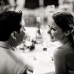 Groom and Bride at their table during the reception.