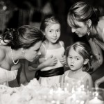 Flower girls visiting with the bride at the wedding reception, Santa Barbara Biltmore.